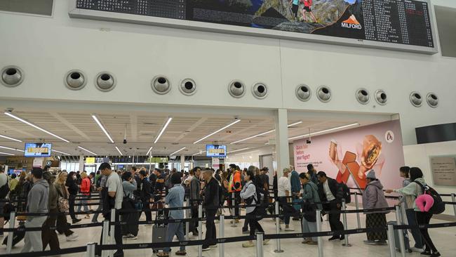 Passengers are left stranded after a cancelled Virgin Australia flight to Sydney at Adelaide Airport in November 2023. Picture: Mark Brake