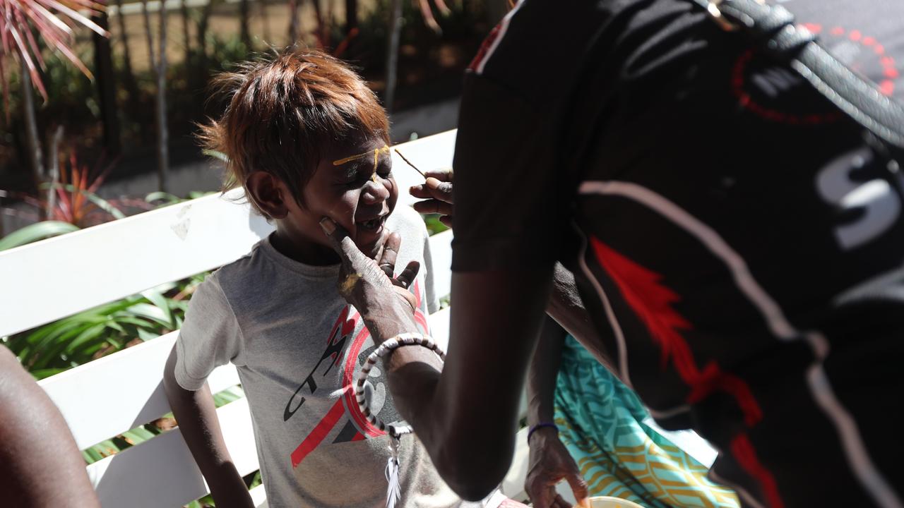 Munupi family members of 47-year-old Pukumani Alimankinni prepared their traditional ochre, armbands and headdresses before performing her Jorrigjorringa (kookaburra) song outside Darwin Local Court following her death in care coronial, on April 24, 2024. Picture: Zizi Averill