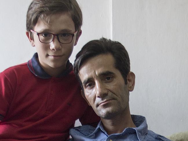11 Sept 2015. Ahmed Rateb with wife Ghosoon Hamzeh and son Laith, 11 are from Syria. They moved to Jordan in 2012 and now live in Marka in east Amman, Jordan. Picture: Ella Pellegrini