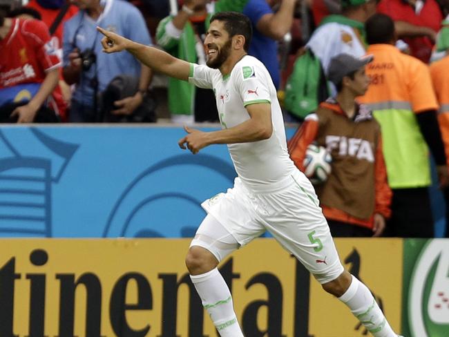 Rafik Halliche celebrates after scoring Algeria’s second goal against South Korea.