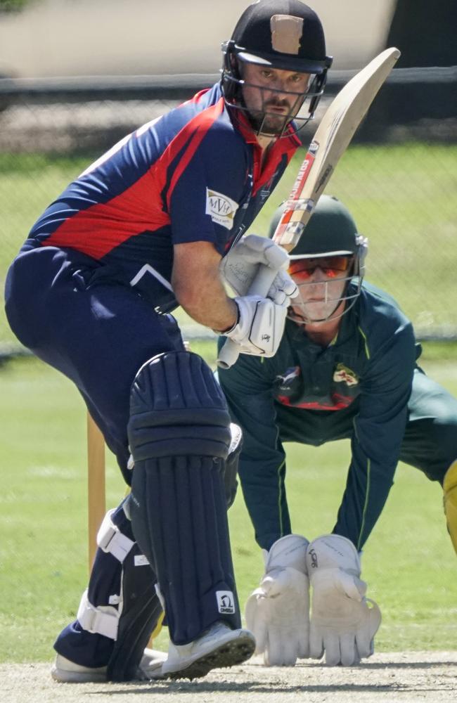 Malvern batsman James Lynch, watched by Caulfield keeper James Small. Picture: Valeriu Campan