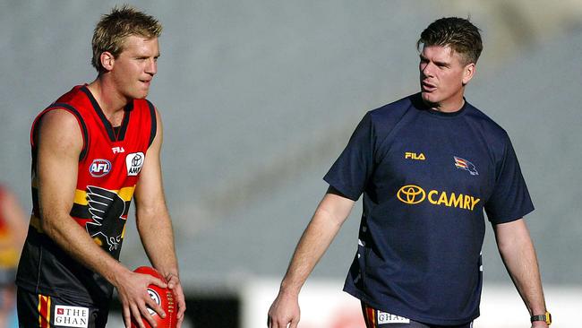 Gary Ayres, pictured with Scott Welsh (left) in 2002, was a key factor behind the Crows’ decision to draft Laurence Angwin in 2000.