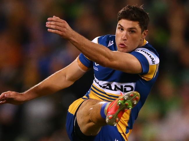 CANBERRA, AUSTRALIA - APRIL 17:  Mitchell Moses of the Eels kicks the ball during the round six NRL match between the Canberra Raiders and the Parramatta Eels at GIO Stadium on April 17, 2021, in Canberra, Australia. (Photo by Matt Blyth/Getty Images)