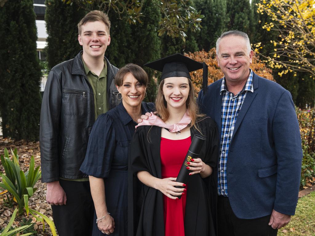 Master of Learning and Teaching graduate Emily Munro with brother Joseph, mum Dr Deborah and dad Brett Munro at a UniSQ graduation ceremony at The Empire, Tuesday, June 25, 2024. Picture: Kevin Farmer