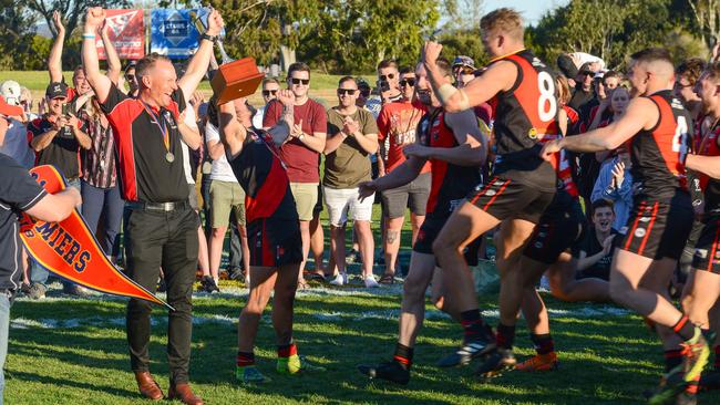 Tea Tree Gully players celebrate winning the division one Adelaide Footy League grand final against Rostrevor Old Collegians at Thebarton Oval in September. Picture: AAP/Brenton Edwards