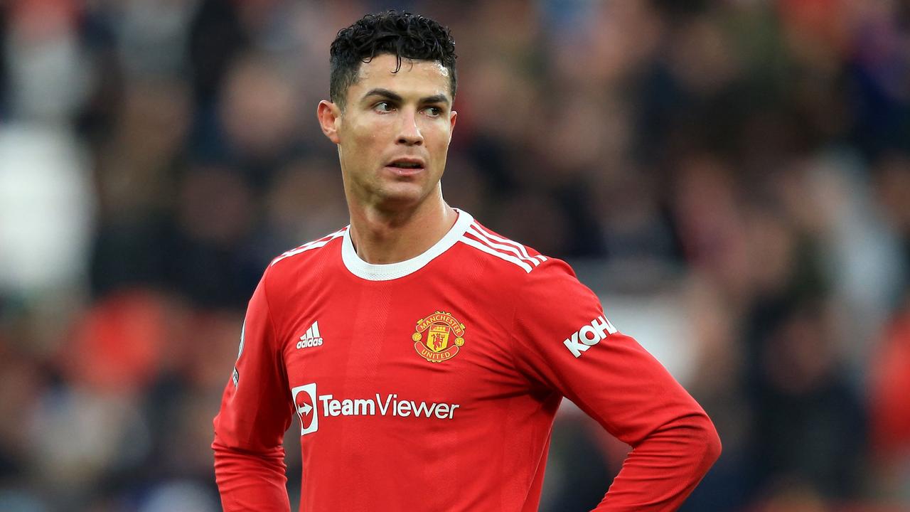 Manchester United's Portuguese striker Cristiano Ronaldo reacts after the final whistle of the English Premier League football match between Manchester United and Watford at Old Trafford in Manchester, north west England, on February 26, 2022. (Photo by Lindsey Parnaby / AFP) / RESTRICTED TO EDITORIAL USE. No use with unauthorized audio, video, data, fixture lists, club/league logos or 'live' services. Online in-match use limited to 120 images. An additional 40 images may be used in extra time. No video emulation. Social media in-match use limited to 120 images. An additional 40 images may be used in extra time. No use in betting publications, games or single club/league/player publications. /
