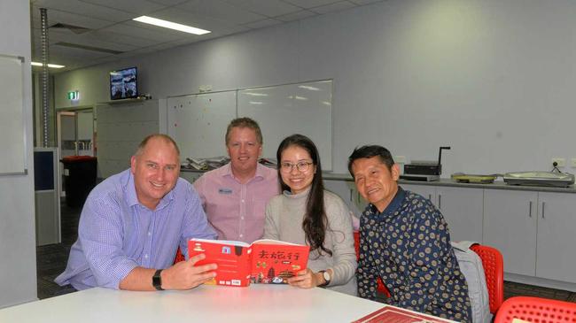 WELCOME TO BUNDY: NewsMail Editor Adam Wratten, Councillor Scott Rowleson and Mr Zhu with his daughter Julia visiting Bundaberg from Nanning. Picture: Geordi Offord