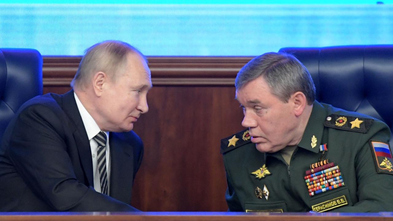 Russian President Vladimir Putin with Chief of the General Valery Gerasimov. Picture: Sergei GUNEYEV / SPUTNIK / AFP.