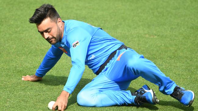 Rashid Khan in action against the Hurricanes on Sunday. Picture: Steve Bell/Getty Images