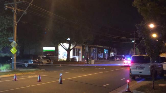 Police swarmed the Park Rd after the fatal shooting. Picture: Shannon Deery