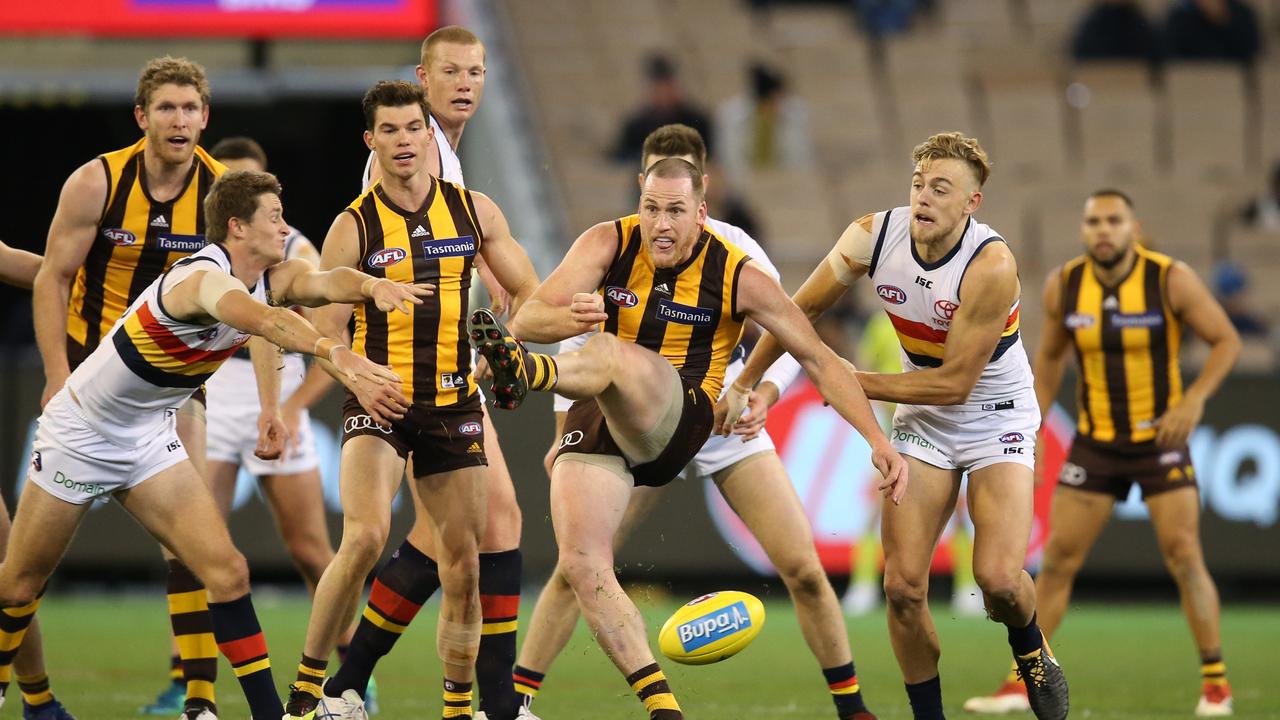 Hawthorn's Jarryd Roughead tries to clear the congestion. Photo: Michael Klein