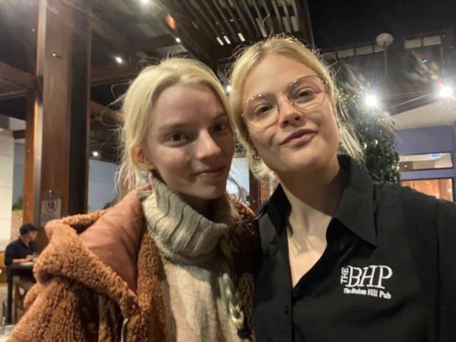 Taylor-Joy at The Broken Hill Pub with worker Ashlee Nicholas. Picture: Jonathan Ng