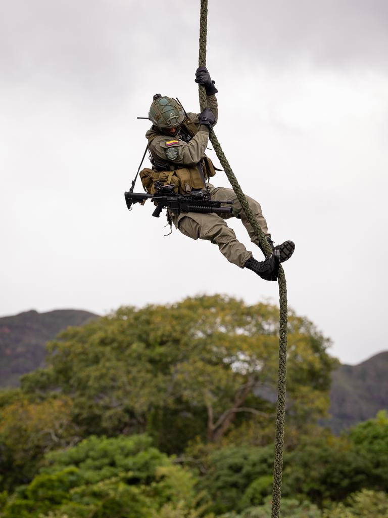 Colombian National Police fast rope down into a coca plantation if they are on a mission to raid an cocaine lab and farm. Picture: Jason Edwards
