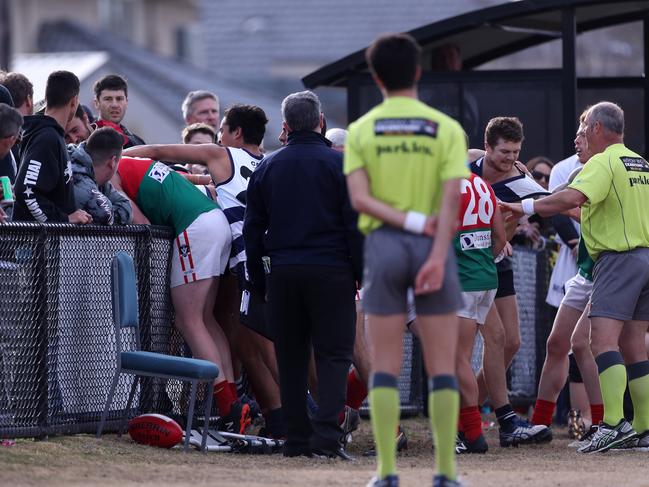 Tempers flared alongside the boundary fence late in the third quarter.