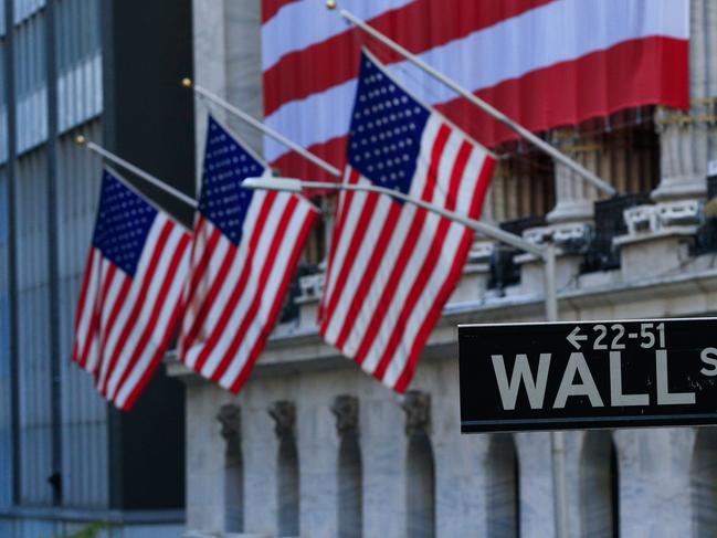 The exterior of the New York Stock Exchange (NYSE) is seen on November 4, 2020 in New York. - Wall Street stocks were in rally mode Wednesday, shrugging off uncertainty over the still-unresolved presidential election and the likelihood of divided government in Washington.The Dow Jones Industrial Average was up 2.0 percent, or about 560 points, at 28,041.28 at around 1530 GMT, (Photo by Kena Betancur / AFP)