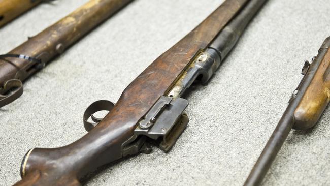 LOADED GUN: A farmer has left a loaded rifle in clear view on a child's bed.