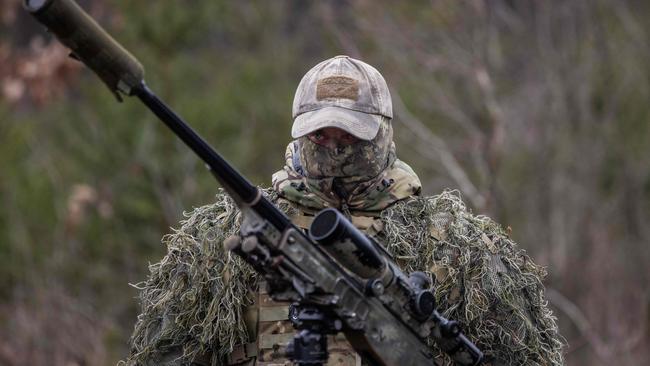 A camouflaged British soldier in Poland for NATO exercises. Picture: AFP