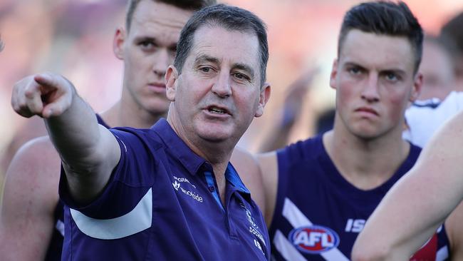 PERTH, WESTERN AUSTRALIA - AUGUST 20: Ross Lyon, Senior Coach of the Dockers, addresses the players at the three quarter time break  during the round 22 AFL match between the Fremantle Dockers and the Richmond Tigers at Domain Stadium on August 20, 2017 in Perth, Australia.  (Photo by Will Russell/AFL Media/Getty Images)