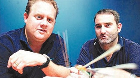 Former North Rockhampton High School mates Bevan Slattery and Stephen Baxter when they sold PIPE Networks in 2009.