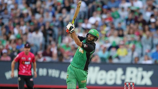 Rob Quiney hits Sean Abbott for a six in a Big bash League match at the MCG. On Saturday, he will play with French Island. Picture:Wayne Ludbey