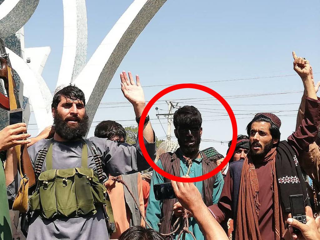 A man is paraded through the streets of Herat by the Taliban.