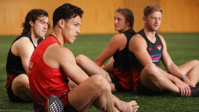 Dylan Shiel of the Bombers stretches during an Essendon training session in Melbourne this week. Picture: Michael Dodge/Getty Images