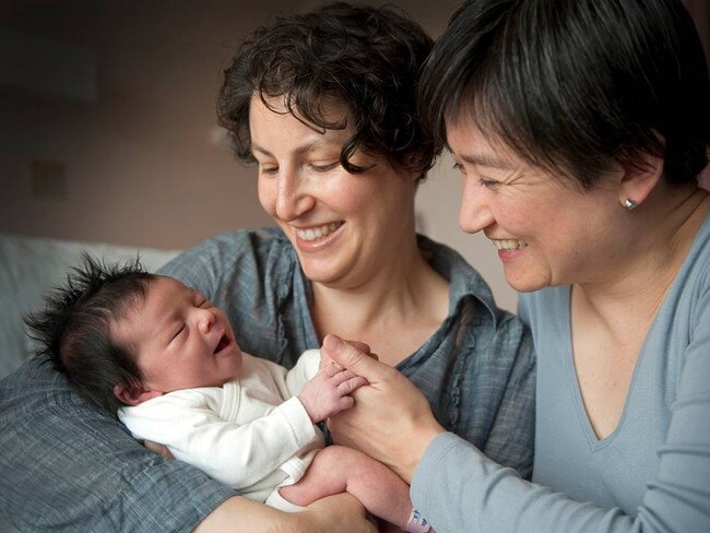 Senator Penny Wong (right) with partner Sophie Allouache and their daughter Alexandra. Picture: AAP Image/David Mariuz