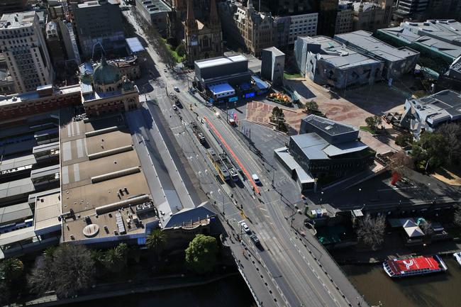 Aerial pictures of empty roads in Melbourne as strict stage 4 lockdowns are enforced. Swanston Street and Federation square. Aaron Francis/The Australian