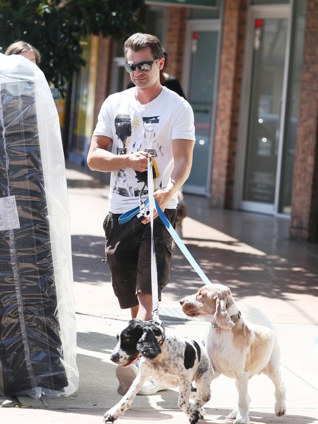 Anthony Koletti, seen picking up his dogs from Woof Dog and Cat Grooming in Rose Bay, enjoyed the high life with his fraudster wife Melissa Caddick. Picture John Grainger