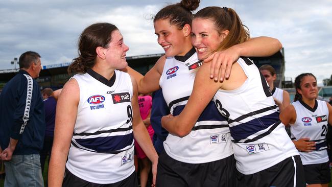 MELBOURNE, AUSTRALIA - MAY 25: Maeve Chaplin of Northern Knights, Nell Morris-Dalton of Nothern Knights and Gabrielle Newton of Nothern Knights celebrate after the game during the NAB League Girls Grand Final match between the Northern Knights and the Calder Cannons at Ikon Park on May 25, 2019 in Melbourne, Australia. (Photo by Luke Hemer/AFL Photos/Getty Images)