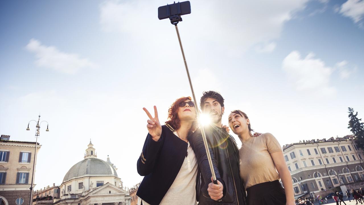 Travellers taking selfies – one of the more annoying things you’ll encounter on an international holiday.