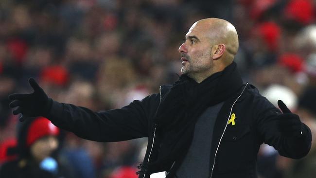 Manchester City's manager Pep Guardiola reacts.