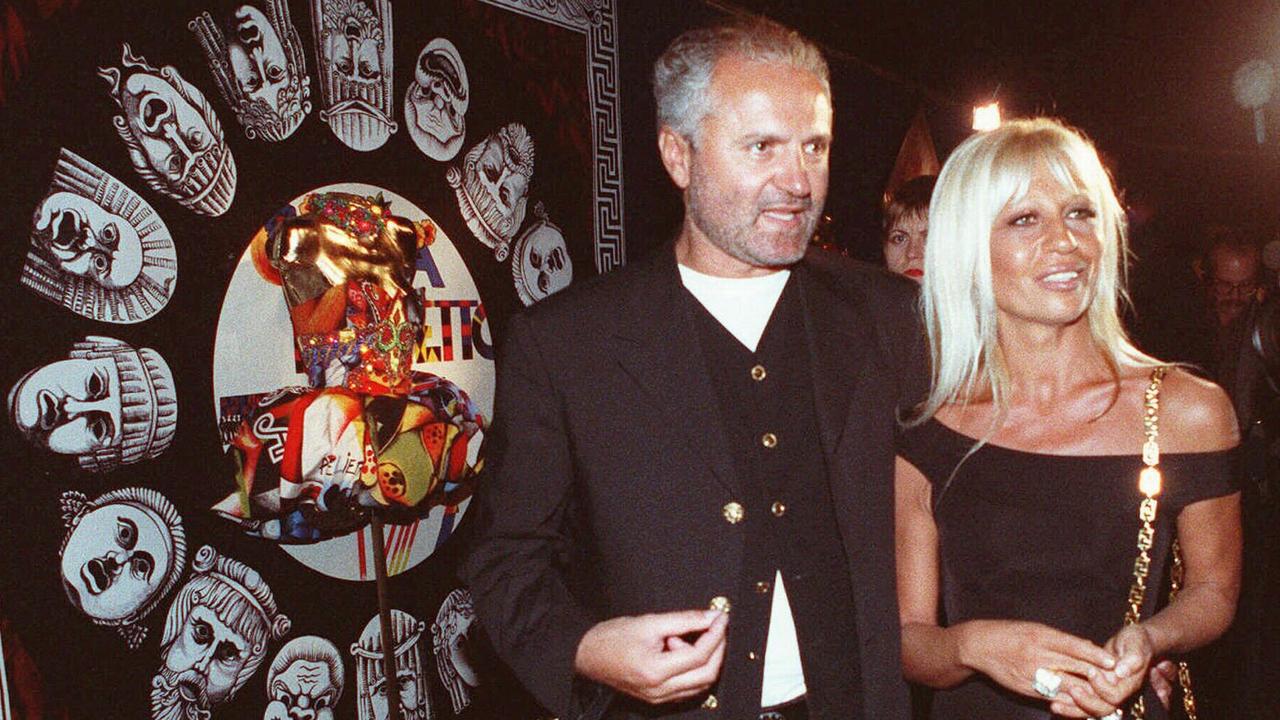 Donatella Versace in 1992 with her late brother Gianni, who was murdered in 1997. Picture: Ron Frehm/AP