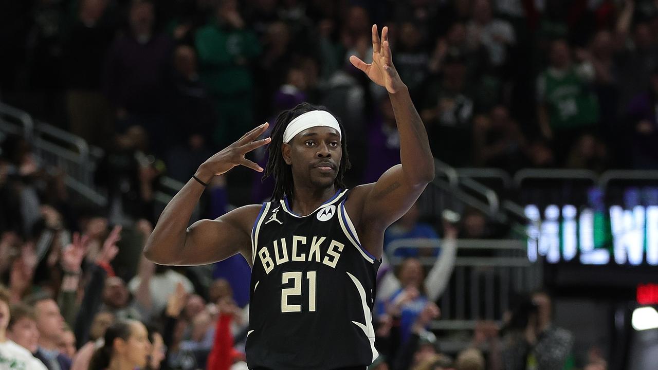 MILWAUKEE, WISCONSIN - FEBRUARY 14: Jrue Holiday #21 of the Milwaukee Bucks reacts to a three point shot in overtime against the Boston Celtics at Fiserv Forum on February 14, 2023 in Milwaukee, Wisconsin. NOTE TO USER: User expressly acknowledges and agrees that, by downloading and or using this photograph, User is consenting to the terms and conditions of the Getty Images License Agreement. (Photo by Stacy Revere/Getty Images)