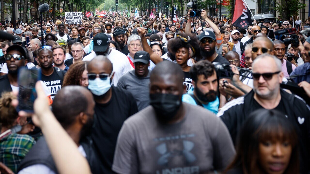 Protesters defy demonstration ban to march against police violence in ...