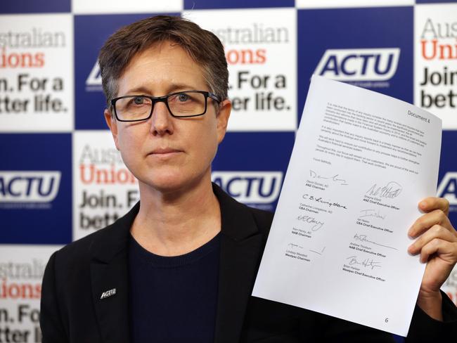 Australian Council of Trade Unions (ACTU) Secretary Sally McManus holds up documents during a press conference in Melbourne, Monday, February 5, 2019. The ACTU will address revelations under FOI Act that there was collusion between Scott Morrison and the banks ahead of an announcement of a Royal Commission. (AAP Image/David Crosling) NO ARCHIVING