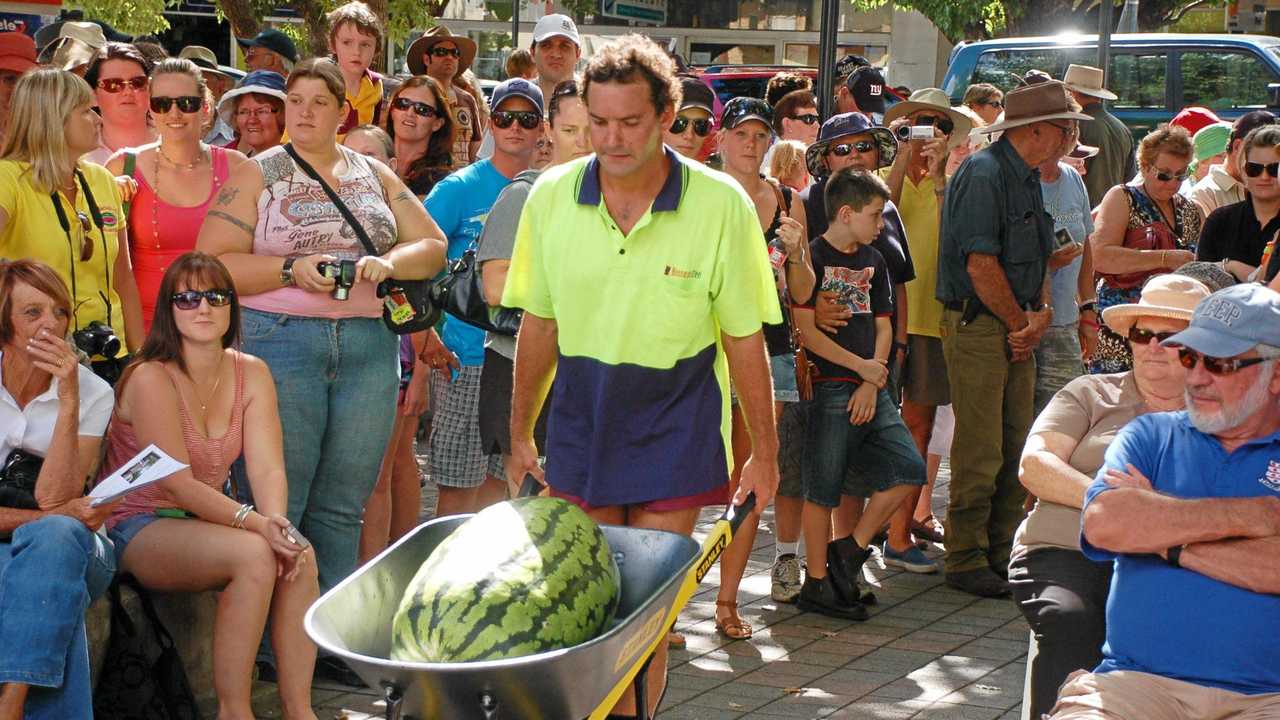 BIG BUSINESS: Matt Davies wheels up his melon for weighing at the last melon festival&#39;s big melon weigh-in. Picture: Jill Poulsen