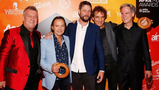 Jimmy Barnes, Phil Small, Ben Quilty, Ian Moss and Don Walker pose after Cold Chisel Won The Ted Albert Award for Outstanding Services to Australian Music during the 2016 APRA Music Awards. Picture: Getty Images