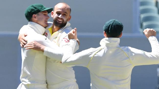 Nathan Lyon celebrates taking the wicket of Moeen Ali. Picture: AAP.