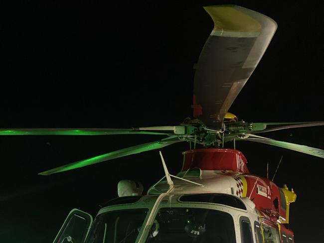 Westpac Lifesaver Rescue Helicopter at Lismore base readying to fly a man in his late teens to the Gold Coast University Hospital with serious head and chest injuries.