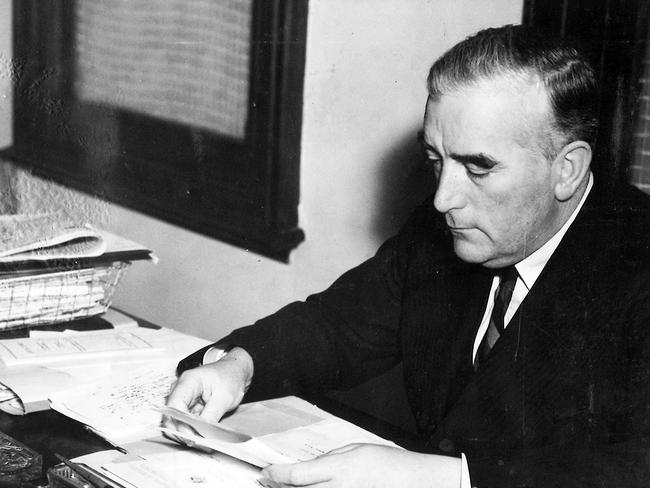 Past and future prime minister Sir Robert Menzies looks over points in a speech to be delivered in the 1940s. Picture: News Corporation Australia