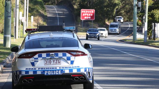 Police on Miles St in Coolangatta on Thursday afternoon as the hard border closure looms. Picture: Glenn Hampson.