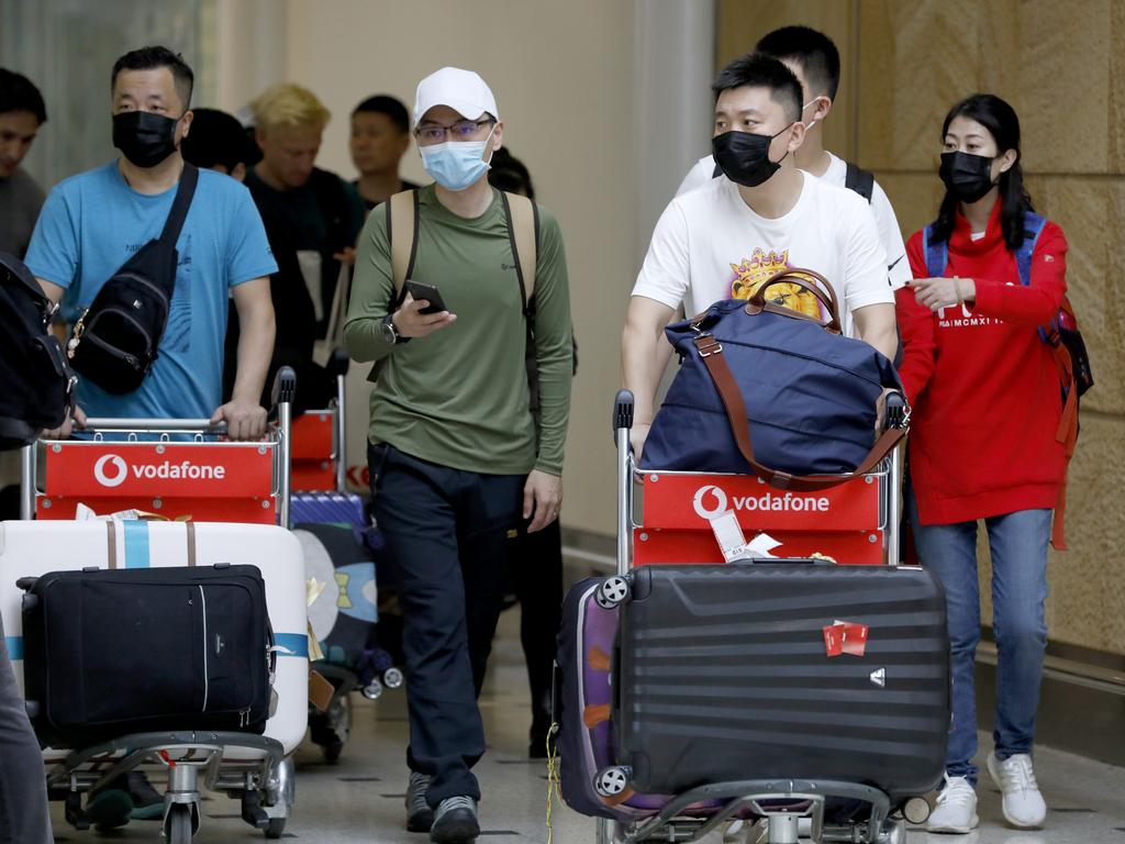 Passengers arrive in Sydney on a flight from China on Thursday. Picture: Chris Pavlich