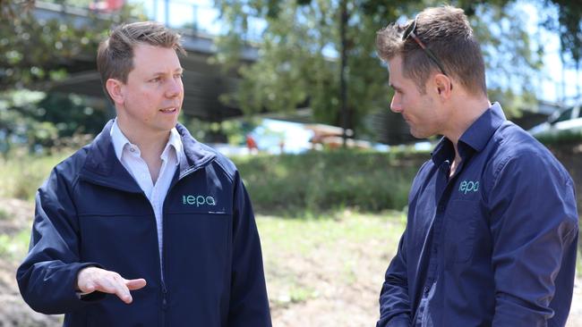 Left: NSW EPA chief executive officer Tony Chappel speaks with Lismore City Council regulation services officer Lachlan Stace about clean-up options under the new $5 million Flood Recovery Program for Contaminated Lands program.