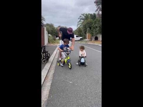 Crafty dad modifies bike so his paralysed son can ride it