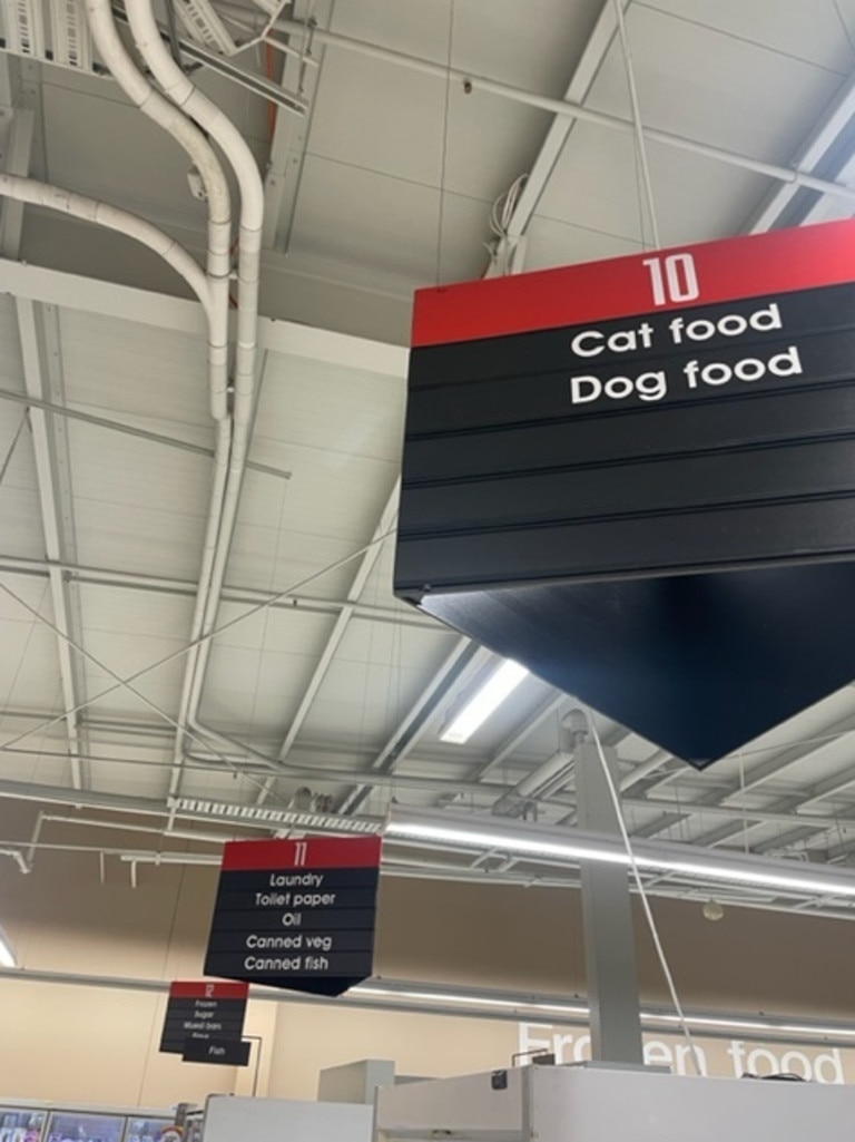 The supermarket created a sign just for its Asian groceries, while keeping cat and dog food together on the same sign. Picture: Coles