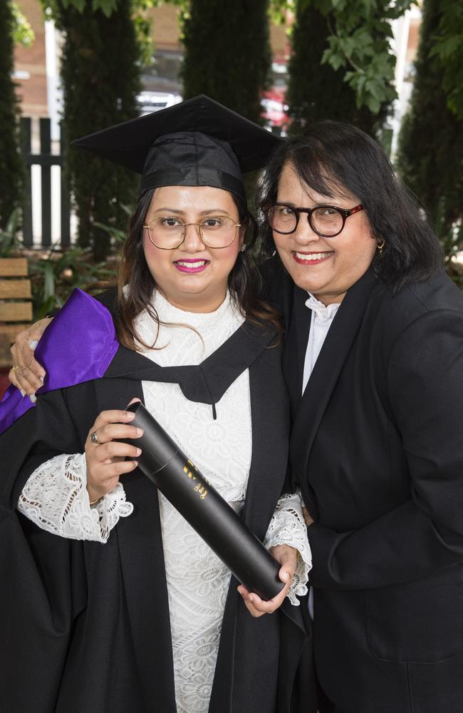 Juris Doctor graduate Sheraleen Kumar is congratulated by her mum Suman Kumar at a UniSQ graduation ceremony at Empire Theatres, Tuesday, February 13, 2024. Picture: Kevin Farmer