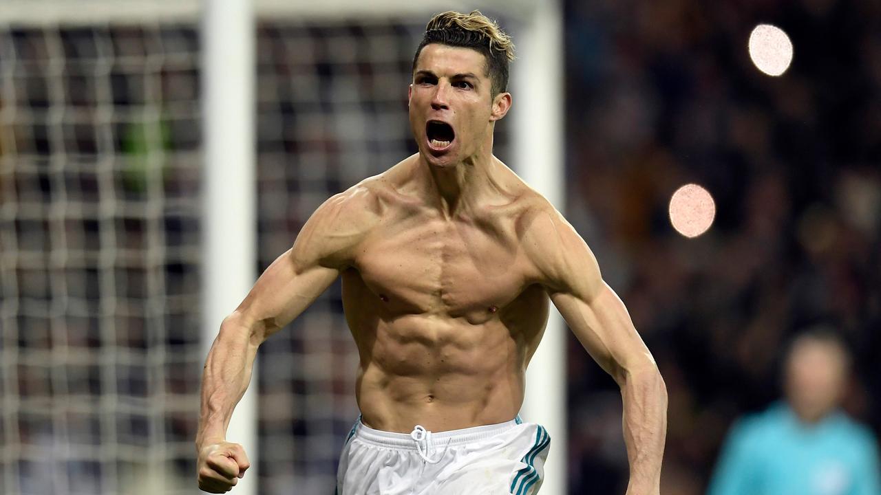 Cristiano Ronaldo celebrates after scoring a penalty during the UEFA Champions League quarter-final second leg match between Real Madrid and Juventus.
