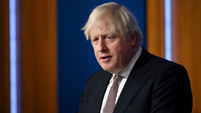 Boris Johnson plans to offer a booster shot to everyone by the end of January 2022, with vaccination centres "popping up like Christmas trees". Picture: Getty Images