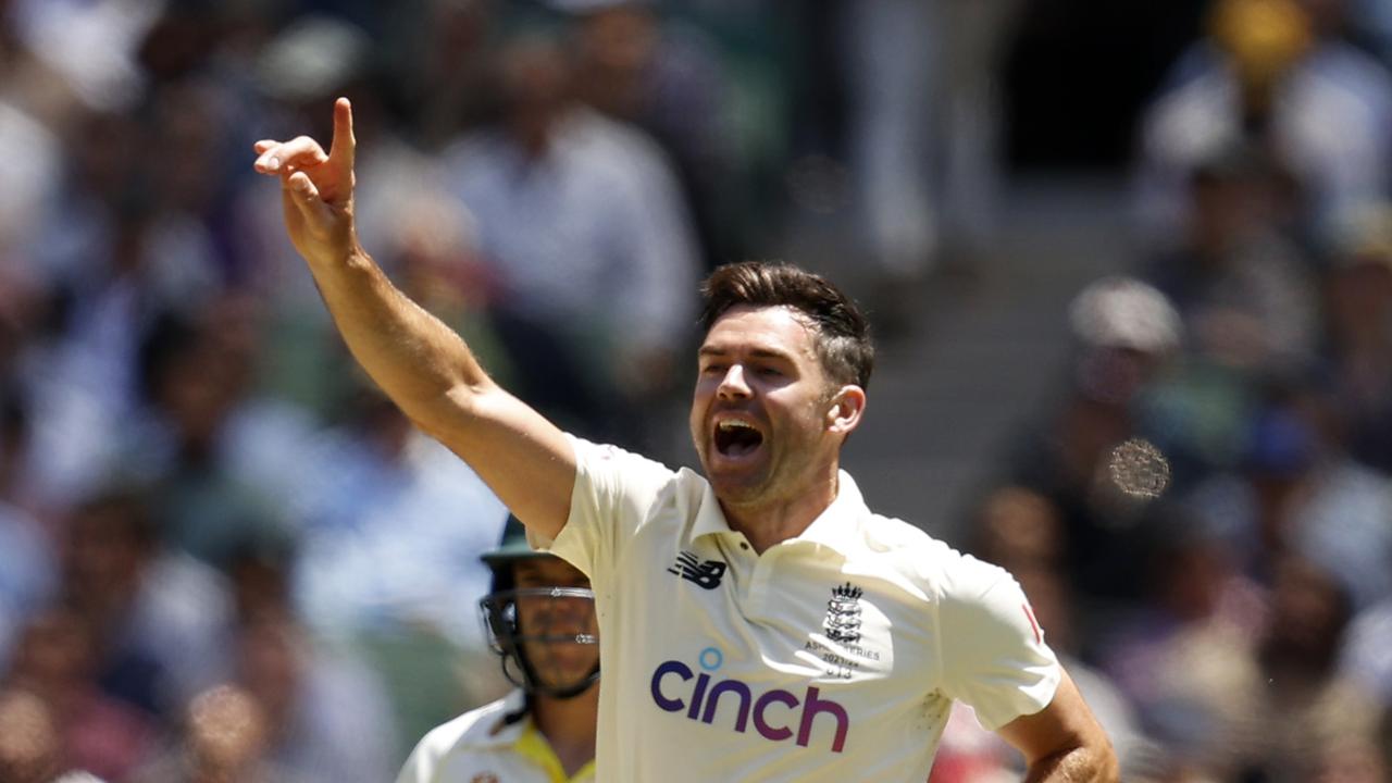 MELBOURNE, AUSTRALIA – DECEMBER 27: James Anderson of England celebrates the wicket of Steve Smith of Australia during day two of the Third Test match in the Ashes series between Australia and England at Melbourne Cricket Ground on December 27, 2021 in Melbourne, Australia. (Photo by Darrian Traynor – CA/Cricket Australia via Getty Images)